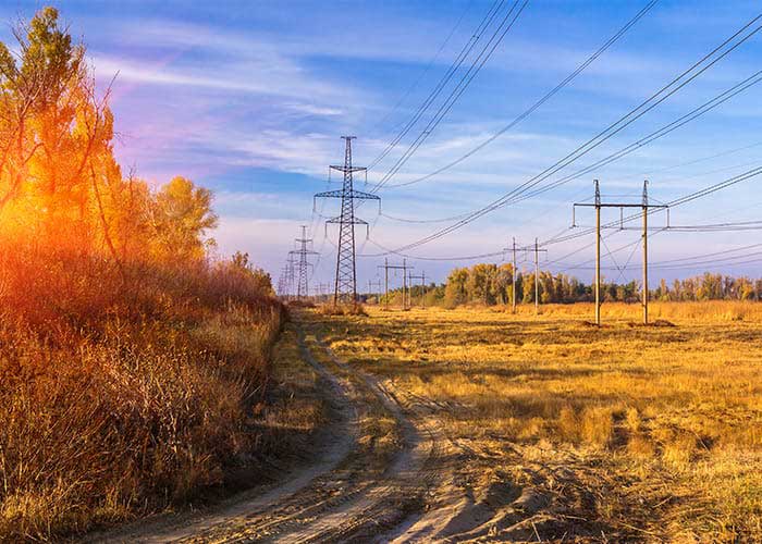 A field with transmission towers.